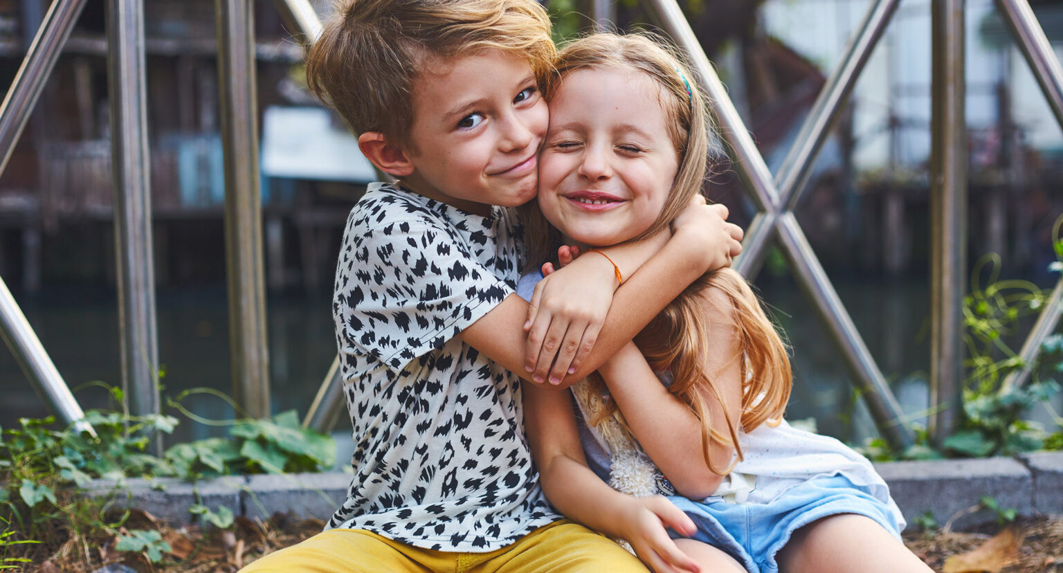 happy siblings